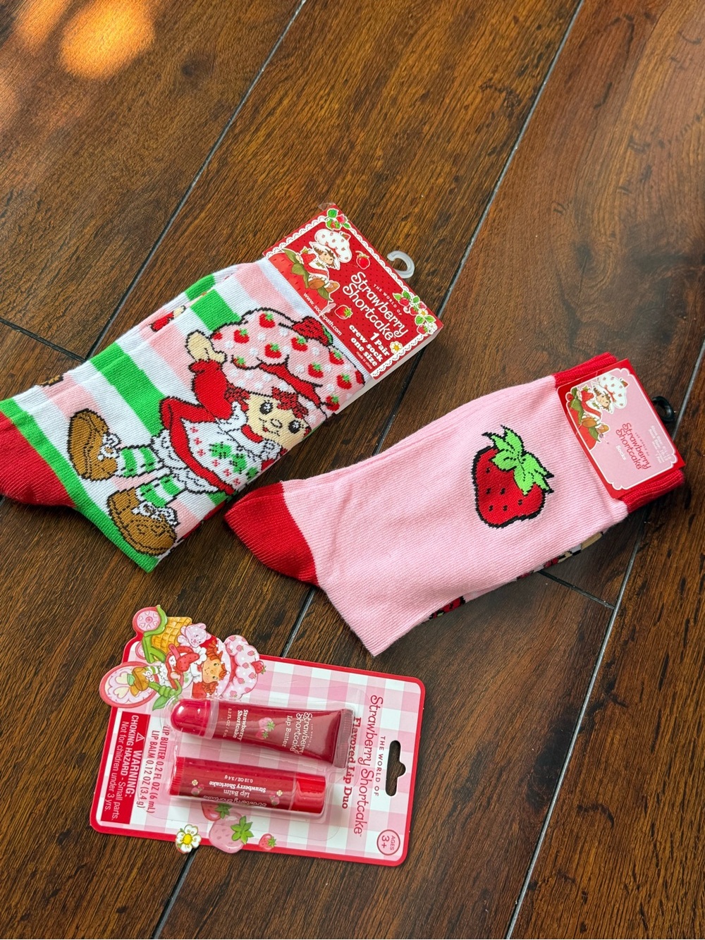 Strawberry Shortcake bundle, 2 pairs of socks and lip gloss balm all new